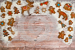 Christmas background with cookies on the old wooden board grunge