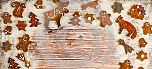 Christmas background with cookies on the old wooden board grunge