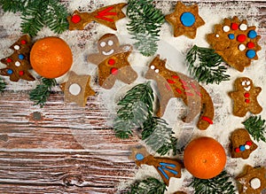 Christmas background with cookies on the old wooden board grunge