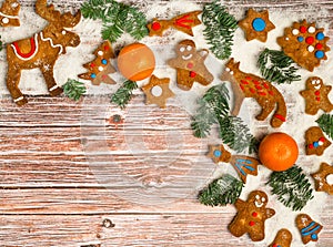 Christmas background with cookies on the old wooden board grunge