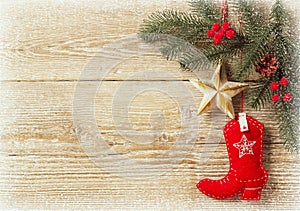 Christmas background with cowboy shoe decoration