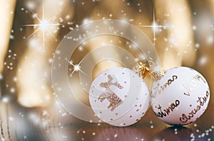 Christmas background, decoration and spruce branches. Christmas balls on a white background. Soft focus. Sparkles and bubbles. Abs