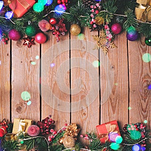 Christmas background with decoration on wooden board. Vintage filter effect.