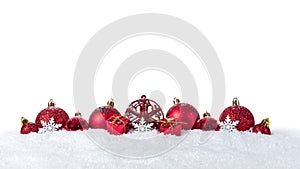 Christmas background with decorations and christmas balls on snow isolated on white background