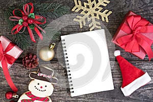 Christmas background decorations with blank open notebook