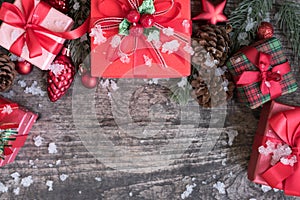 Christmas background with decorations gift boxes and red ornament