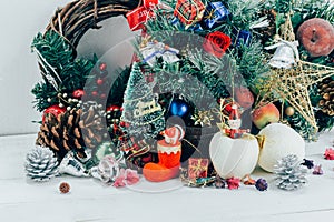 Christmas background with decorations and gift boxes on wooden