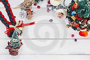 Christmas background with decorations and gift boxes on wooden