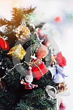 Christmas background with decorations and gift boxes on wooden