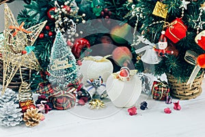 Christmas background with decorations and gift boxes on wooden