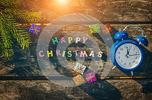 Christmas background with decorations and gift boxes on wooden board. Concept of countdown. New year greeting card