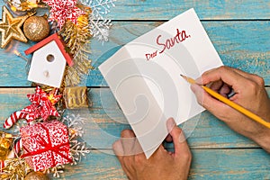 Christmas background with decorations with hand writting on greeting cards. Top view with copy space