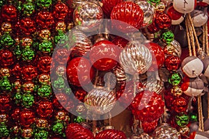 Christmas background of decorative balls including mercry ornaments in grreen and red and silver