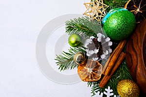 Christmas background with dried oranges, decorated pine cones