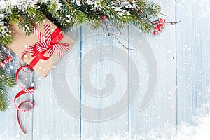 Christmas background with fir tree and gift box