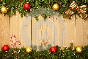 Christmas background with firtree, candies and baubles