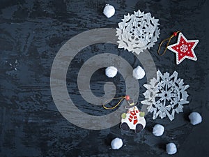Christmas background with free space for writing text. Christmas decorations and paper snowflakes