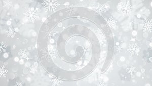 Christmas background of fuzzy and focused snowflakes