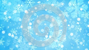 Christmas background of fuzzy and focused snowflakes