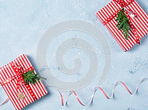 Christmas background with gift boxes and decorations, stone table, top view