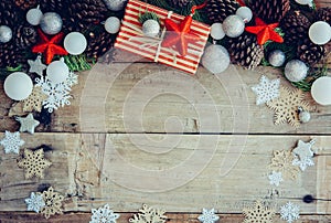 Christmas background with gift boxes and decorations on the wood