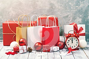 Christmas background with gift boxes and shopping bags. Christmas sale concept.