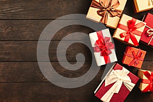 Christmas background with gift boxes on wooden table