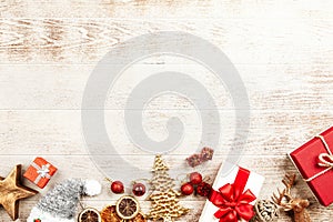 Christmas background with gift boxes on wooden table