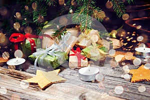 Christmas background with gift on wooden background with Fir branches. Xmas and Happy New Year composition.