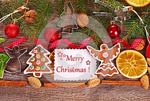 Christmas background with gingerbread cookies and decoration