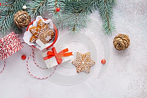 Christmas background with gingerbread cookies and gift box
