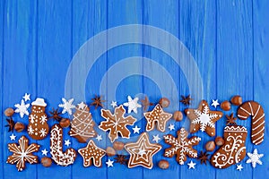 Christmas background. Gingerbread cookies, spices, hazelnuts and