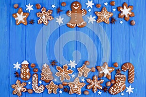 Christmas background. Gingerbread cookies, spices, hazelnuts and