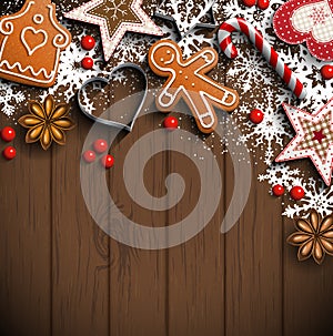 Christmas background with gingerbread, spices and ornaments