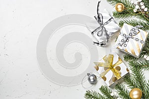 Christmas background with Gold and white present box and decorat