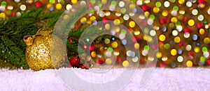 Christmas background with golden ball.