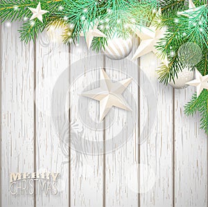 Christmas background with green branches and yellow ornaments