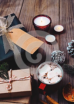 Christmas background with handmade present gift boxes and rustic decoration