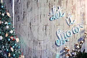 Christmas background with the inscription Let it snow. Toning