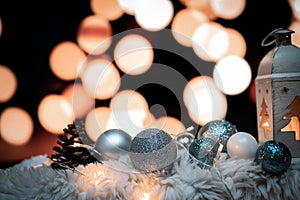 Christmas background with lantern and christmas balls in the snow,decoration,christmas time is comming
