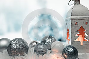 Christmas background with lantern and christmas balls in the snow,decoration,christmas time is comming