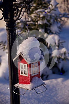 Christmas background. Lantern lamp, cowered by snow