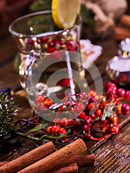 Christmas background with mug decoration lemon slice hot drink .