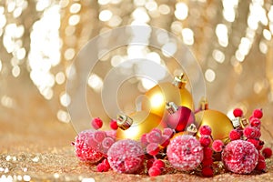 Christmas background, new year close up red and gold decoration balls on glitter abstract blurred holiday bokeh background