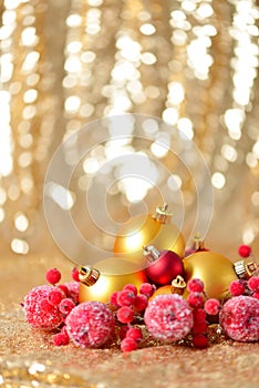 Christmas background, new year close up red and gold decoration balls on glitter abstract blurred holiday bokeh background