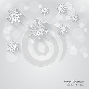 Christmas background with paper snowflakes.