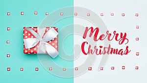 Christmas background. Pastel blue festive winter holidays backdrop. Beautifully wrapped christmas present. Xmas card.