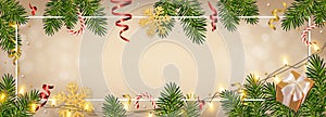 Christmas background with realistic pine branches, shining garlands, gifts box, candy, glitter gold snowflakes, tinsel