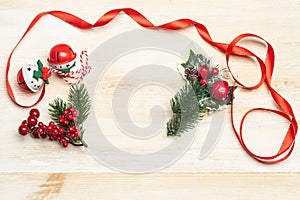 Christmas background. Red decorative ornaments of ribbons or bows or stars