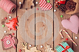 Christmas background with rustic Christmas decorations on wooden table. View from above